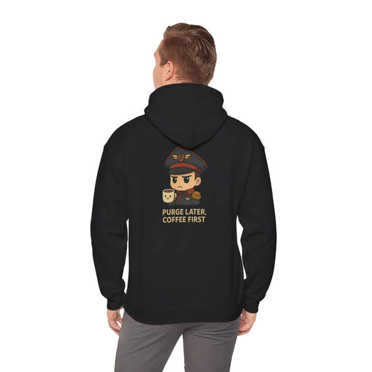 Black hoodie with a character design and text on the back, worn by a person.